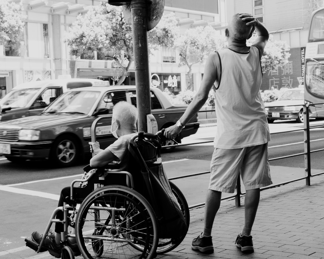 Support worker assisting a wheelchair user